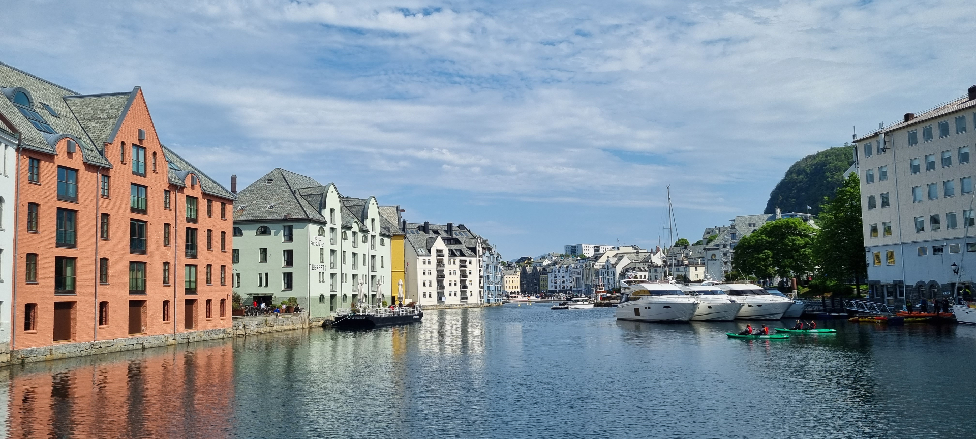 View over the canal in Ålesund town centre with Art Nouveau buildings and boats